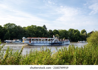 London Borough of Richmond upon Thames, UK - July 17, 2022: The tourist boat Yarmouth Belle on the Thames River.