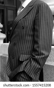 A London Business Man Wearing A Pinstripe Suit