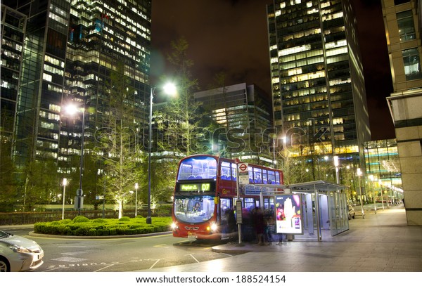 LONDON, CANARY WHARF UK - APRIL 4,\
2014: Canary Wharf tube, bus and taxi station in the night, modern\
station bringing about 100 000 workers to the aria every\
day