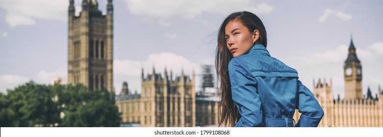 London City Europe Travel Destination Asian Beauty Woman At Westminster Houses Of Parliament Panoramic Banner . Autumn Holiday Lifestyle Blue Rain Coat For Fall.