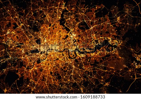 LONDON city lights map at night. Satellite view. Aerial view of London. Global communications and networking. Cyberspace in big city.  Mixed media