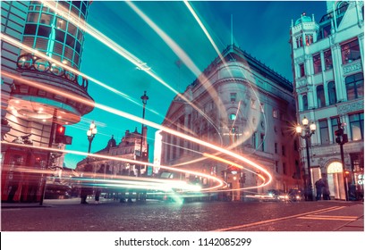 London City In Night Time With Busy Traffic 