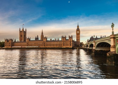 London cityscape with Palace of Westminster, Elizabeth Tower (Big Ben) and the Westminster Bridge over the River Thames in a morning light