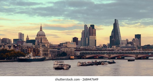 London cityscape at sunset panorama with urban buildings over Thames River