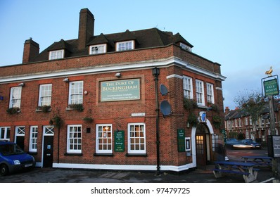 LONDON - DEC 5: Exterior of pub, for drinking and socializing, focal point of the community, on Dec 5, 2010, London, UK. Pub business, now about 53,500 pubs in the UK, has been declining every year - Shutterstock ID 97479725