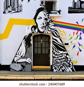 LONDON - DECEMBER 6. Street art at Chelsea Arts Club doorway based on Pink Floyd's The Dark side of the Moon album and synchronicity with the film The Wizard of Oz; December 6, 2014; Chelsea, London.