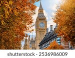 London during autumn time with the Big Ben clocktower at Westminsterin and colourful foliage