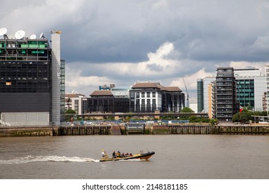 London, England - 03 04 2021: A Group Of Tourist On A High Speed Boat On The River Thames .