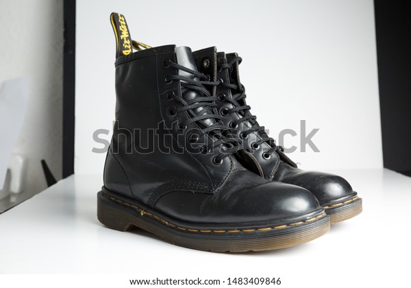 london, england, 05/05/2019 Dr Martens 1460 Black\
Leather Boots 8 Eye lace hole. fashionable punk historic british\
made leather boots. dr martens air war with bonding soles. built to\
last. 