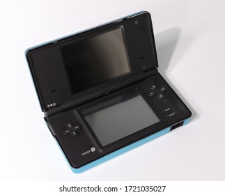 London, England, 05/05/2019 A Metallic  Blue Nintendo Ds Dsi Hand Held Vintage Console On A White Studio Background. Retro Video Gaming Handset. Nostalgic Computer And Arcade Games Family Fun