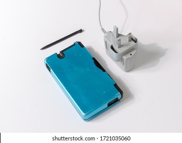 London, England, 05/05/2019 A Metallic  Blue Nintendo Ds Dsi Hand Held Vintage Console On A White Studio Background. Retro Video Gaming Handset. Nostalgic Computer And Arcade Games Family Fun