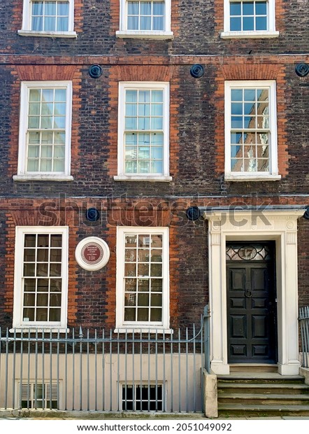 LONDON, ENGLAND - 05.09.2021. The former house\
of famous English writer and lexicographer Dr Samuel Johnson\
located at 17 Gough Square in a charming 300-year-old townhouse in\
City of London.\
Vertical