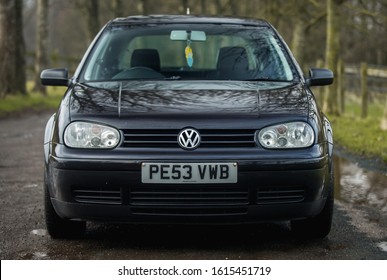 London, England, 07/01/2020 Black hot hatch sports hatchback VW Volkswagen Golf Mark MK 4 GT TDI GTI made in 2003 in Germany with aftermarket black R32 wheels and tinted rear windows 