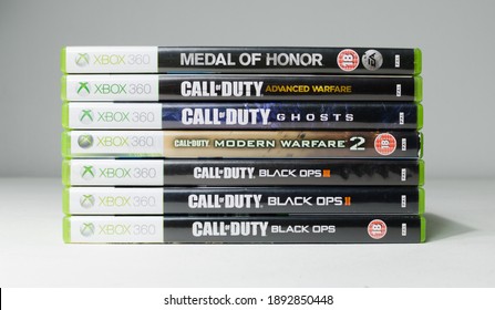 London, England, 08.05.2018 A Large Pile Stack Of Used Call Of Duty COD Xbox 360 Video Game Cases And Dvd Games. Microsoft Xbox 360 Home Arcade System Video Games.