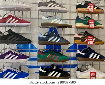 London, England - 1 August 2022: A Display Of Traditional And Retro Adidas Trainers And Sports Shoes In A Mens Designer Clothing Shop