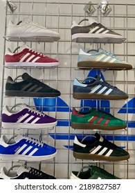 London, England - 1 August 2022: A Display Of Traditional And Retro Adidas Trainers And Sports Shoes In A Mens Designer Clothing Shop