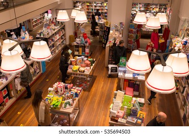 London, England - 11 December 2016: Interior Of A Modern Bookshop With People From Above Browsing The Collection.