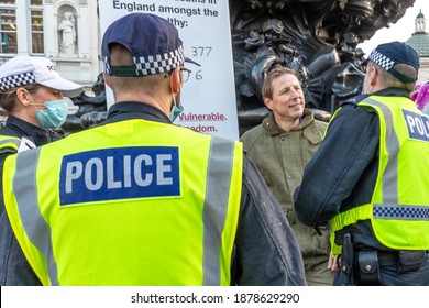 London, England. 19th December 2020. Anti Lockdown Protest Held In Parliament Square. Photographer : Brian Duffy