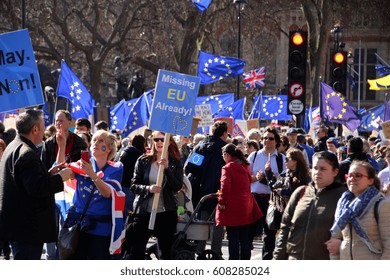LONDON, ENGLAND - 25 MARCH 2017: Protesters rally against Brexit in front of parliament in London, England. The UK has stated its intention to begin withdrawal from the EU on 29 March 2017. Editorial.