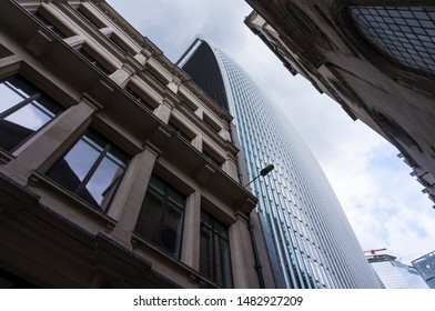 London, England - 9 June 2019: Fantastic Classic Architecture In City Of London With Skyscrapers In Background. New Versus Old Architecture. Classic And Modern Facade. 20 Fenchurch Street In London 