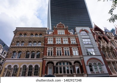 London, England - 9 June 2019: Fantastic Classic Architecture In City Of London With Skyscrapers In Background. New Versus Old Architecture. Classic And Modern Facade. 20 Fenchurch Street In London 