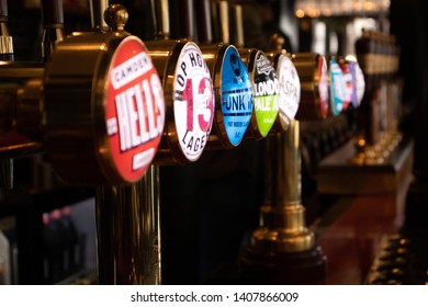 London, England - APRIL 1, 2019: Draught Beer Taps In A Traditional Pub In London, UK