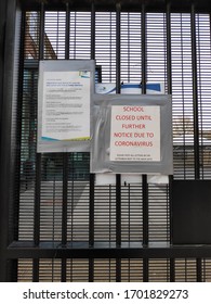 London / England - April 2020: Sign And Letter Outside Closed School Gates Explaining School Is Closed Due To Coronavirus Covid-19 Pandemic Flu Outbreak Lockdown Measures By UK Government.