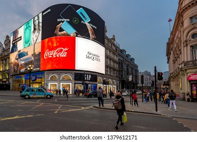 London, England, April 21, 2019: Piccadilly Circus At Twilight With The Huge Billboards Behind.
