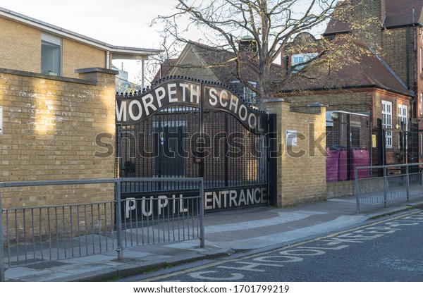 London / England -April 9th 2020: Morpeth Secondary\
school back entrance gates closed due to coronavirus London\
lockdown measures by UK government. mixed boys & girls\
outstanding school. Bethnal\
green