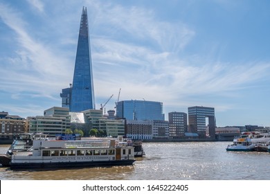 London, England -August 01 2018: Wyndham Party Boat Moored On The River Thames In Froint Of The Shard Skyscraper In The City Of London, UK.