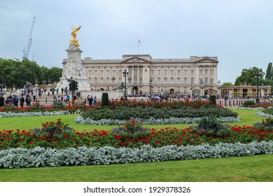 London, England -August 12th, 2018: Queen`s home in wonderful Buckingham Palace, surrounded by many tourists wanting to catch a glimpse of royal family