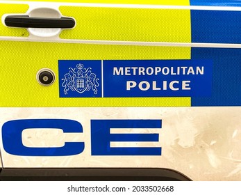 London, England - August 2021: Badge And Markings On The Side Of A Metropolitan Police Van