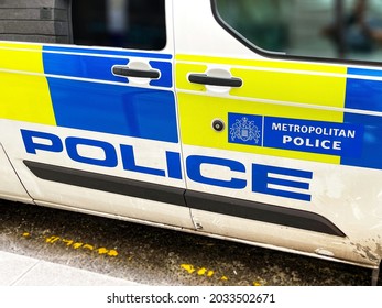 London, England - August 2021: Badge And Markings On The Side Of A Metropolitan Police Van