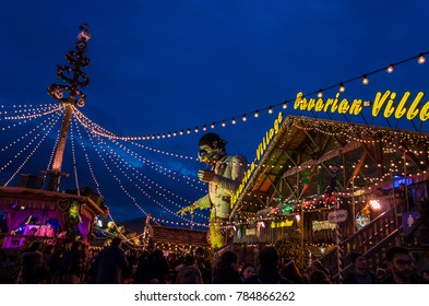 London, England - December 30, 2017: The popular Winter wonderland amusement park and Christmas market illuminates the night at Hyde Park
