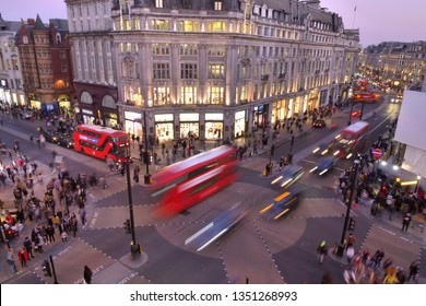 London, England - February 26, 2019: Aerial Image Of Oxford Circus And Regent Street Junction With Rush Hour Traffic Of Both Pedestrians, Cars And Double Deck Buses.