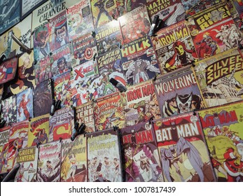 London, England - January 13, 2018: Color comics adverts on a window shop in London, England.