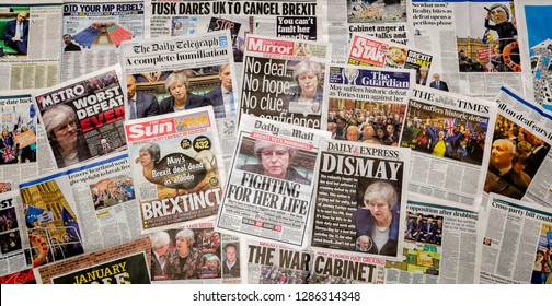 London, England - January 16, 2019: British newspaper front pages reporting Prime Minister Theresa May's Brexit Deal has been rejected in parliament by a record 432 votes in historic commons defeat