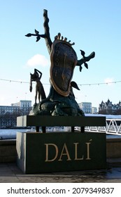 London, England - January 20 2007: Salvador Dali statue of the melting clock on the Embankment close to the entrance to the London eye.