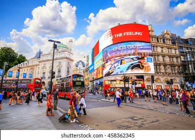 LONDON, ENGLAND - JULY 03, 2016. People And Traffic In Picadilly Circus In London.A Famous Public Space In London's West End,it Was Built In 1819. 