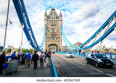 LONDON, ENGLAND - JULY 16,2016. People And Transportation On London's Tower Bridge, An Iconic Symbol Of London, England.

