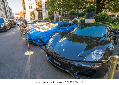 LONDON, ENGLAND - JULY 2018: Supercars Parked Outside The Dorchester Hotel In London. One Of The Best Places In The World To Spot Super Cars, Especially After Ramadan