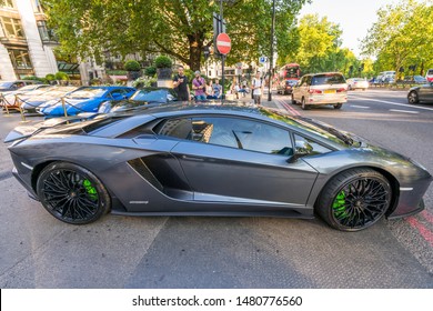 LONDON, ENGLAND - JULY 2018: Supercars Parked Outside The Dorchester Hotel In London. One Of The Best Places In The World To Spot Super Cars, Especially After Ramadan