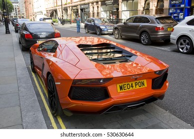 LONDON, ENGLAND - JULY 30: Lamborghini Aventador Parked On The Street On July 30, 2016 In London. One Of The Best Places In The World To Spot Super Cars, Especially After Ramadan. 