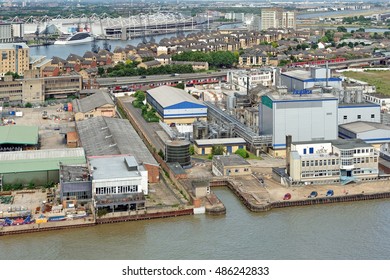LONDON, ENGLAND - JULY 7, 2016: Aerial view of an industrialised district on the north bank of the Thames in the London Borough of Newham that is undergoing a major Â£3.5billion redevelopment.