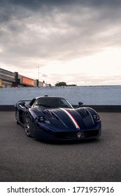 London, England - June 2020: Blue Carbon Fiber Maserati MC12 Supercar Parked At A Service Centre For Performance Cars In Suburban London.  Only 50 Of These Cars Were Made By Maserati.