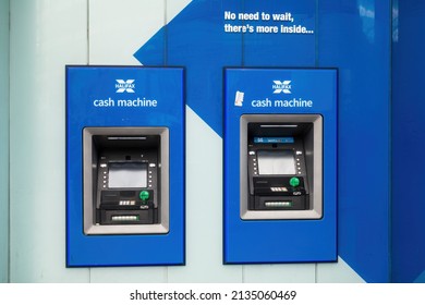 London, England, March 12th 2022: Halifax ATM Cash Machines, Tottenham Court Road Branch, UK. Twin Machines For Access To Fast Cash Withdrawals. Credit Card Transaction. Concept For Finance Technology