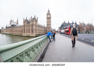 London, England March 2017 : Big Ben Westminster Abbey Parliament And Bridge View With Tourists Indicating Busy Day