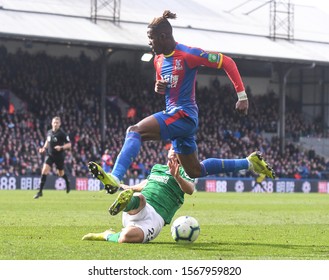 LONDON, ENGLAND - MARCH 9, 2019: Wilfried Zaha Of Palace Pictured During The 2018/19 Premier League Game Between Crystal Palace FC And Brighton & Hove Albin FC At Selhurst Park.