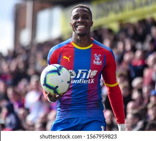 LONDON, ENGLAND - MARCH 9, 2019: Wilfried Zaha Of Palace Pictured During The 2018/19 Premier League Game Between Crystal Palace FC And Brighton & Hove Albin FC At Selhurst Park.