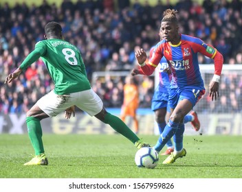 LONDON, ENGLAND - MARCH 9, 2019: Wilfried Zaha Of Palace Pictured During The 2018/19 Premier League Game Between Crystal Palace FC And Brighton & Hove Albin FC At Selhurst Park.